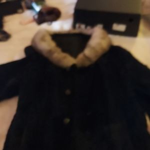 A Cute Winter jacket that is made out of real Fur